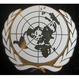 insigne métallique de béret plat de l'ONU