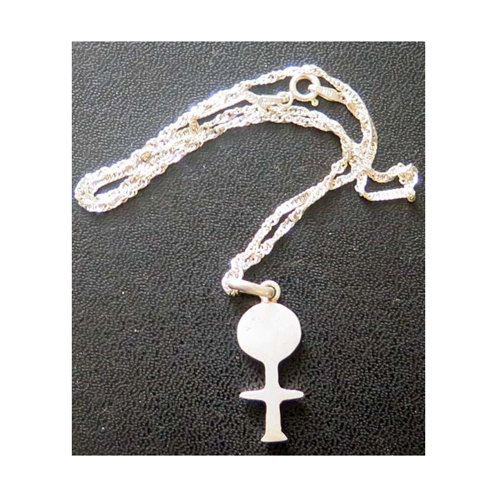 Chainette torsadée en argent mauritanienne représenatnt un homme stylisé (hauteur du bijou 2,9 cm)
