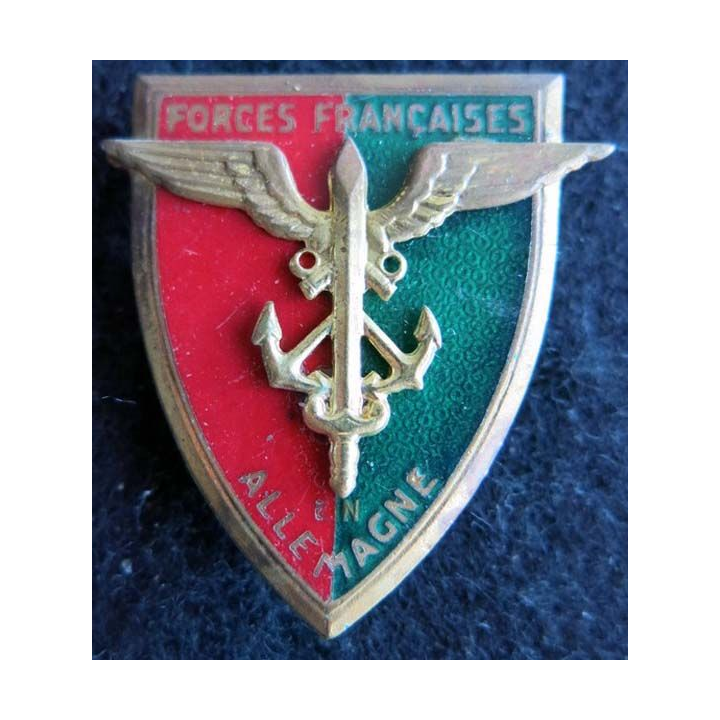 FFA : Insigne métallique des forces françaises en Allemagne de fabrication Drago G. 803 applique collée