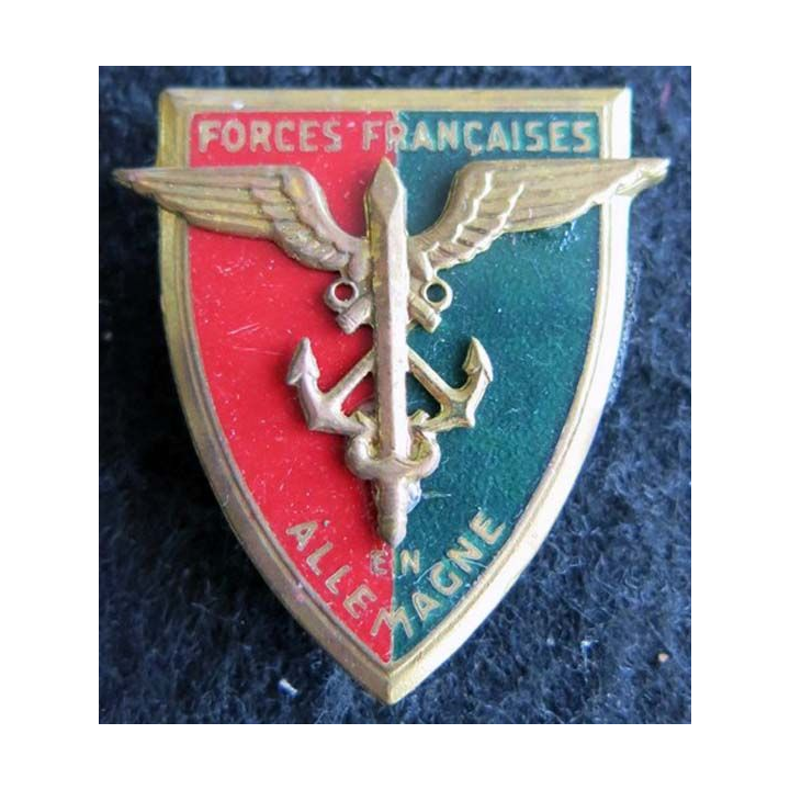 FFA : Insigne métallique des forces françaises en Allemagne de fabrication Drago G. 803 applique collée