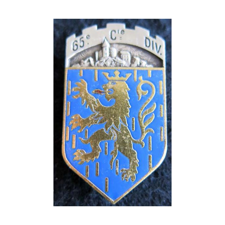 65° CD : Insigne métallique de la 65° compagnie divisionnaire de fabrication Drago Paris G. 2733 en émail