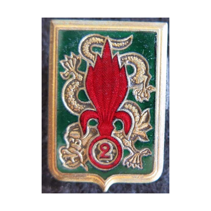 2° REI : Insigne métallique du 2° régiment étranger d'infanterie Extrême Orient Drago O. Métra déposé émail