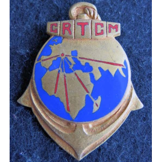 CRTCM : insigne métallique du centre de regroupement des troupes coloniales en métropole Drago Béranger H. 554 émail