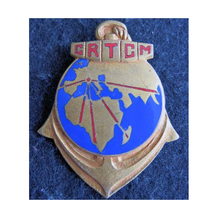 CRTCM : insigne métallique du centre de regroupement des troupes coloniales en métropole Drago Béranger H. 554 émail