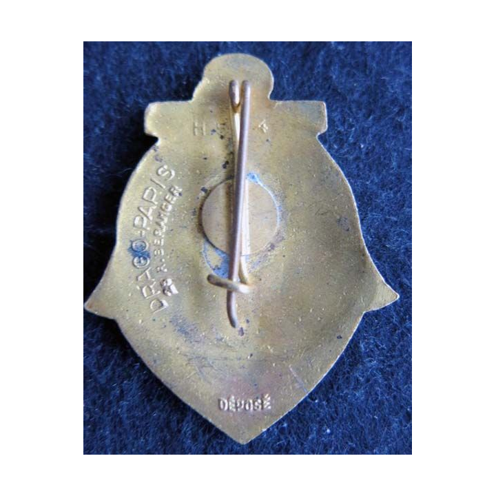 CRTCM : insigne métallique du centre de regroupement des troupes coloniales en métropole Drago Béranger H. 554 émail