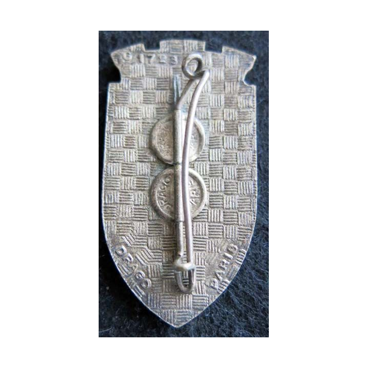 CNI EOR : insigne métallique du centre national d'instruction des EOR de fabrication Drago G. 1723 émail