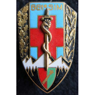 661° SIM : insigne métallique de la 661° section d’infirmiers militaires de fabrication Drago O.M déposé H. 701 émail