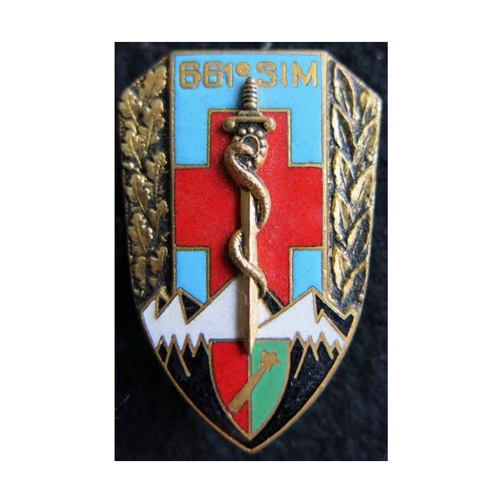 661° SIM : insigne métallique de la 661° section d’infirmiers militaires de fabrication Drago O.M déposé H. 701 émail