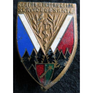 CISS WILDBAD : insigne métallique du centre d’instruction du service de santé de WILDBAD de fabrication Drago Paris en émail