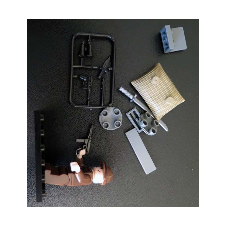Pochette comprenant 1 personnage avec accessoires divers