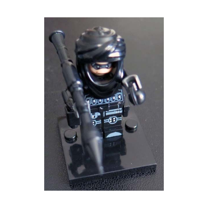 Pochette comprenant 1 personnage DAESH avec accessoires divers