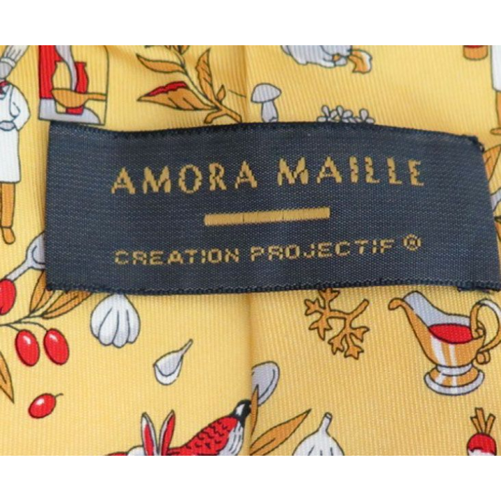 Cravate  Amora Maille 100 % soie dominante jaune avec lapins et navets moutarde