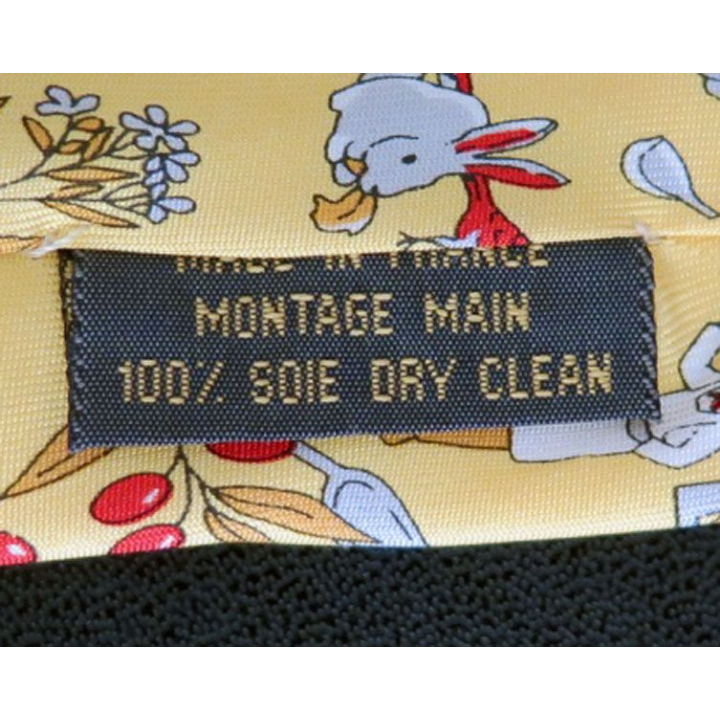 Cravate  Amora Maille 100 % soie dominante jaune avec lapins et navets moutarde