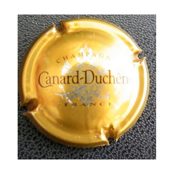 Capsule Muselet de bouteille de champagne Canard Duchêne n° 75g Or bronze