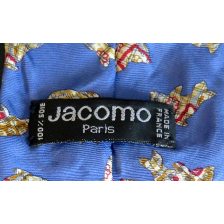 Cravate Jacomo Paris 100 % soie dauphins sur fond bleu