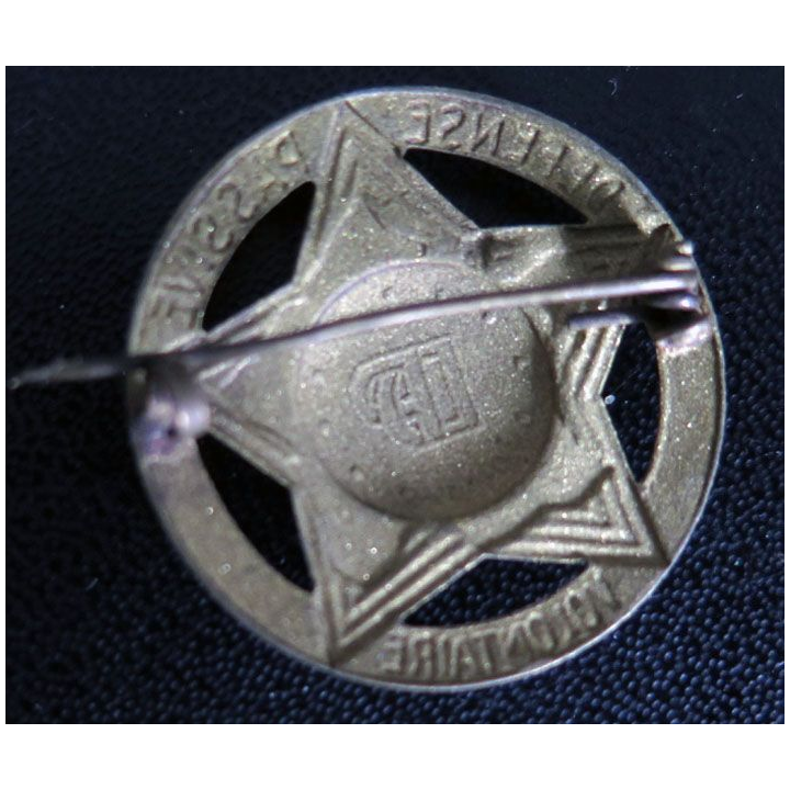 Insigne des volontaires de la défense passive en laiton
