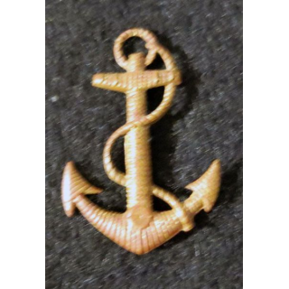 insigne de calot des troupes coloniales métal doré matricé 29 mm