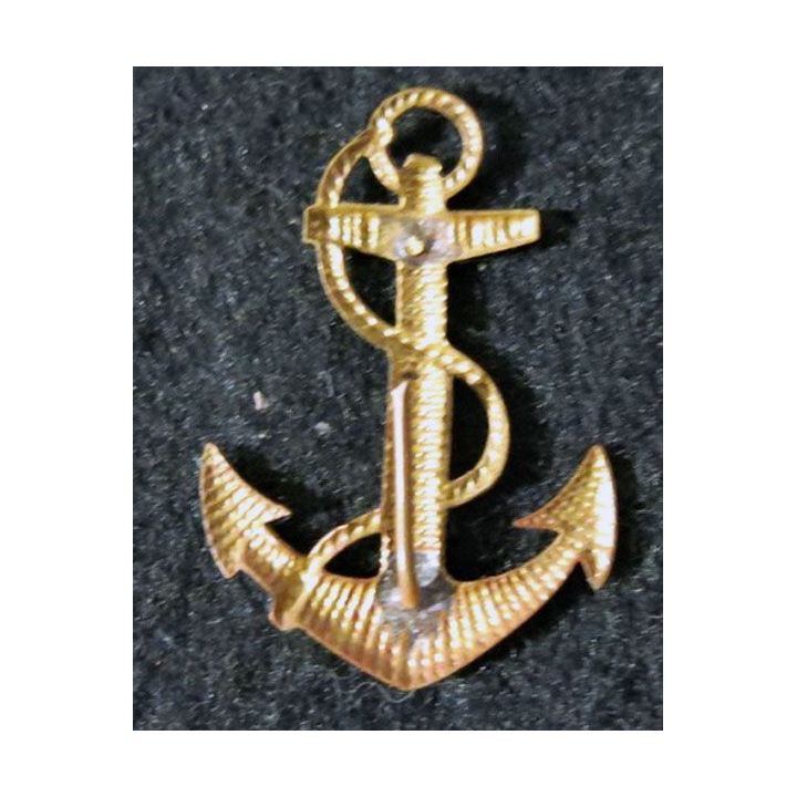 insigne de calot des troupes coloniales métal doré matricé 29 mm