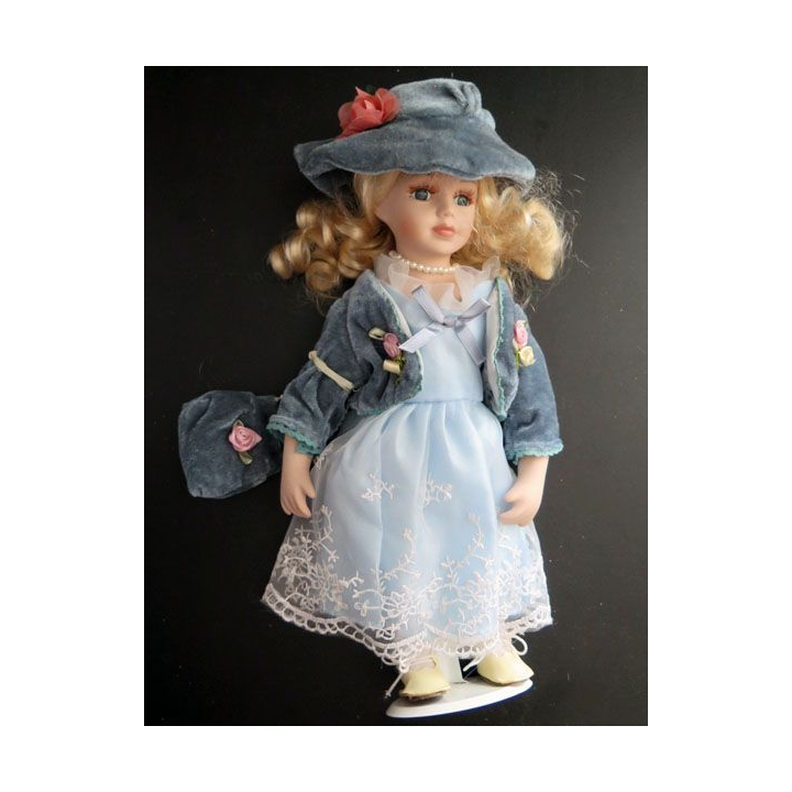 Poupée tête mains et pieds en porcelaine 31 cm