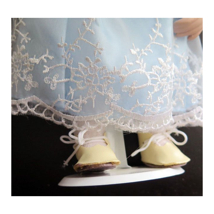 Poupée tête mains et pieds en porcelaine 31 cm