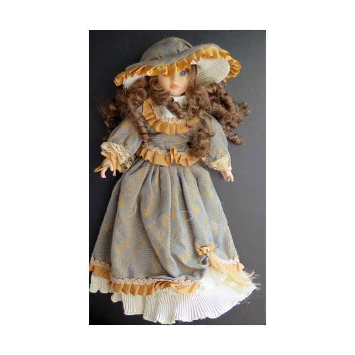 Poupée tête mains et pieds en porcelaine 31 cm