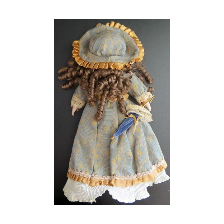 Poupée tête mains et pieds en porcelaine 31 cm