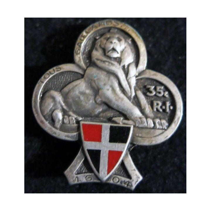 35° RI : Insigne métallique du 35° régiment d'infanterie de fabrication Drago Paris G. 913 dos grenu pontets