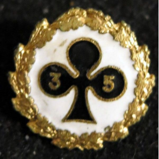 35° RI : insigne métallique du 35° régiment d'infanterie fabrication non spécifiée émail