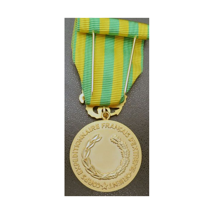Médaille commémorative d'Indochine en métal doré mat