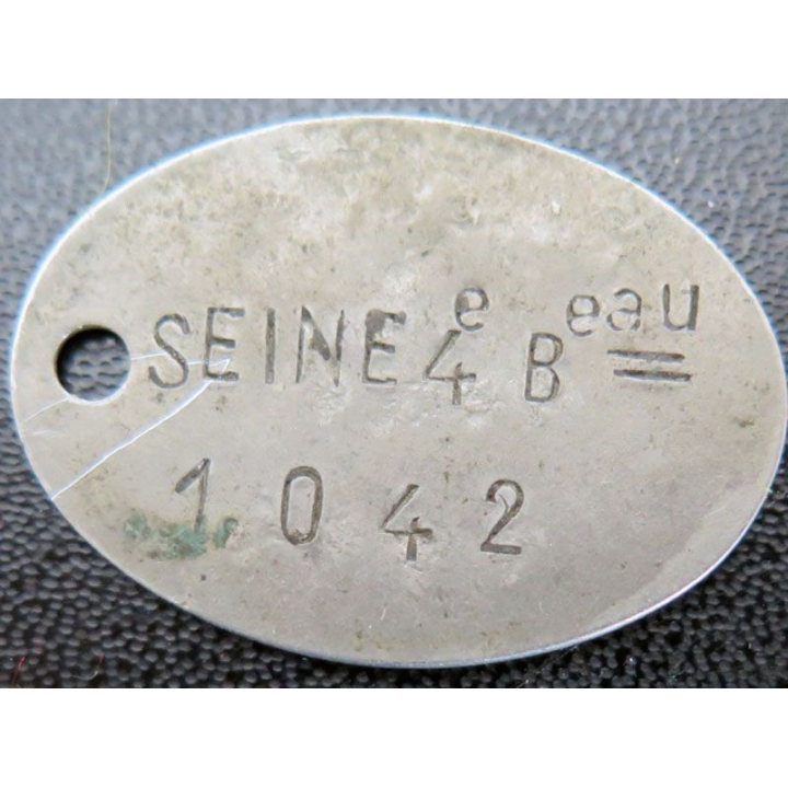 plaque métallique attribuée en 1914 à René Caillet Seine 4°B°au 1042
