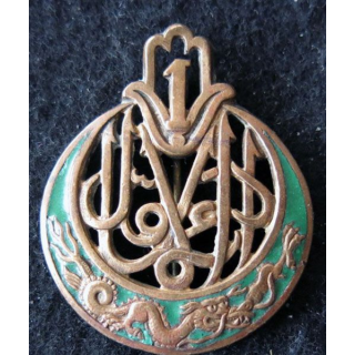 1° RTA : insigne métallique du 4° bataillon de marche du 1° régiment de tirailleurs algériens Drago Paris Beranger émail