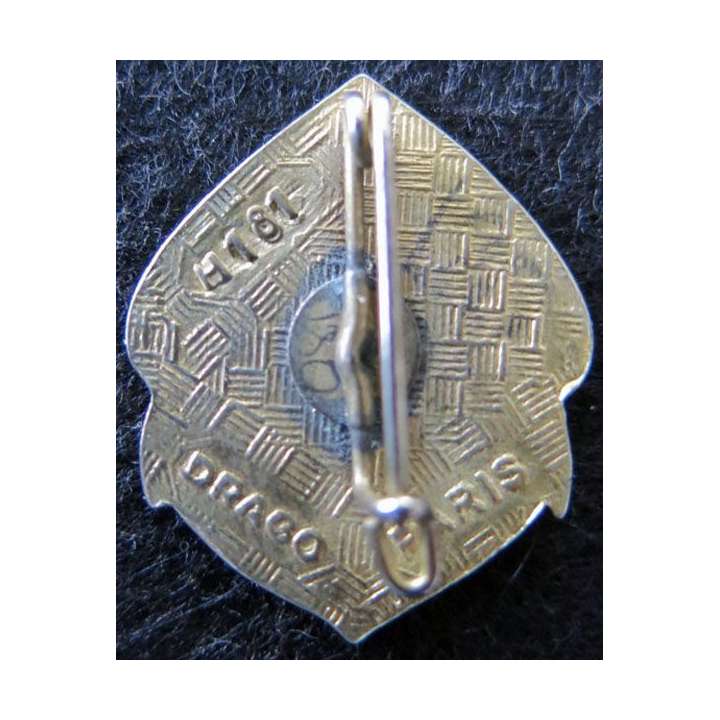 RMT : insigne métallique du régiment de marche du Tchad de fabrication Drago H. 181 argenté