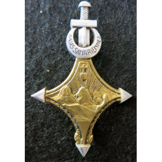 SAHARA : insigne du territoire des oasis sahariennes OUARGLA Drago G. 819 doré argenté