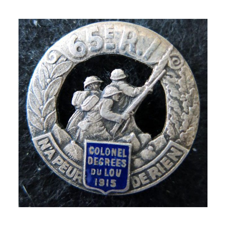 65° RI : insigne métallique du 65° régiment d'infanterie de fabrication Drago Paris Beranger en émail