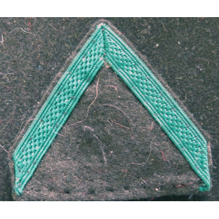 Galon de soldat de 1° Classe de la légion sur crochets